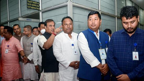Assam chief minister Himanta Biswa Sarma along with other ministers and MLAs stand in a queue to cast their vote for the Rajya Sabha election, at Assam Legislative Assembly, in Guwahati on Thursday. (ANI) Assam chief minister Himanta Biswa Sarma along with other ministers and MLAs stand in a queue to cast their vote for the Rajya Sabha election, at Assam Legislative Assembly, in Guwahati on Thursday. (ANI)