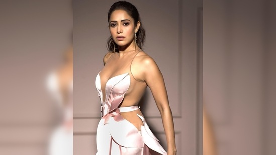 This gorgeous showstopping dress is from the recently launched Surya Sarkar's privé couture 2022 collection.(Instagram/@nushrrattbharuccha)