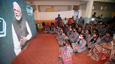 School students watch a broadcast of Prime Minister Narendra Modi's address during the 'Pariksha Pe Charcha' programme, in Patna. (PTI)