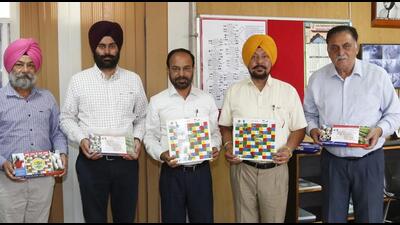 Officials of PAU with the ludo game, developed by the university, in Ludhiana on April 1, 2022. (HT PHOTO) Officials of PAU with the ludo game, developed by the university, in Ludhiana on April 1, 2022. (HT PHOTO)