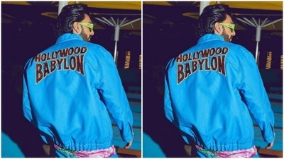In white boots and large green framed tinted shades, Ranveer posed like a true blue fashion icon. (Instagram/@ranveersingh)