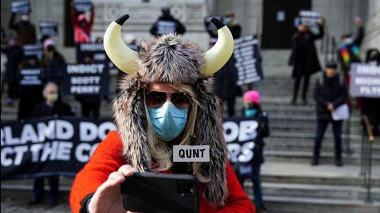 A protester dressed as the ‘QAnon shaman’ is pictured during a protest to support indictments in the January, 6, 2021 Capitol Hill riots in the Manhattan borough of New York City, New York, US, January 6, 2022. (REUTERS)