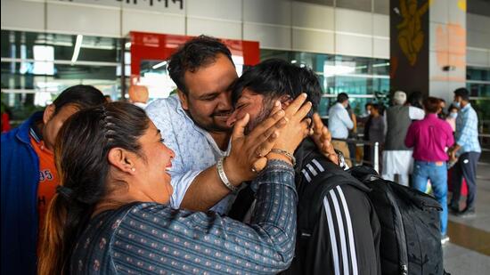 New Delhi, India - March 07, 2022: Indian students, returned from Ukraine amid crisis after Russia invades Ukraine, received by emotional parents and other relatives at Indira Gandhi International (IGI) airport in New Delhi, India, on Monday, March 07, 2022. (Photo by Amal KS / Hindustan Times) (Hindustan Times)