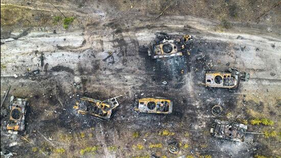 Destroyed Russian armoured vehicles are seen on the outskirts of Kyiv, Ukraine, on Thursday. (AP)