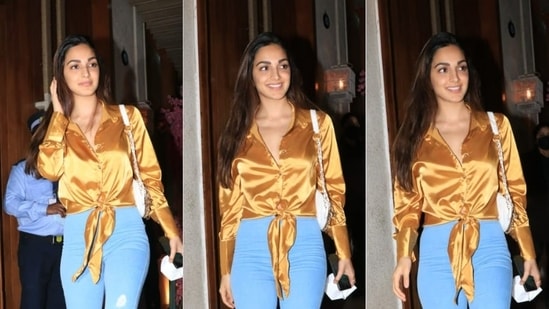 Kiara Advani was earlier spotted by the paparazzi in a gorgeous golden-coloured satin tying shirt teamed with blue pants.(HT Photo/Varinder Chawla)
