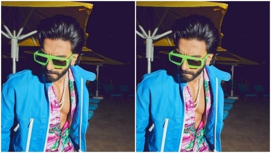 In back brushed gel hairdo and white beaded neck chain, Ranveer set the fashion bar higher for us.(Instagram/@ranveersingh)