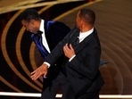 Will Smith hits presenter Chris Rock on stage while presenting the award for best documentary feature at the Oscars on March 27. (AP Photo) Will Smith hits presenter Chris Rock on stage while presenting the award for best documentary feature at the Oscars on March 27. (AP Photo)