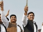Pragatisheel Samajwadi Party (Lohia) chief Shivpal Singh Yadav with his nephew and Samajwadi Party chief Akhilesh Yadav.