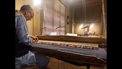 An artisan weaving a shawl at the cultural centre in Srinagar. An artisan weaving a shawl at the cultural centre in Srinagar.