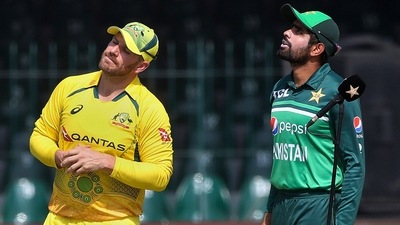 Pakistan's skipper Babar Azam, right, and his Australian counterpart Aaron Finch. (AP)