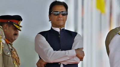 Imran Khan will continue as the PM even if he loses the trust vote until a new leader is sworn in, Pakistan minister said. (AP) Imran Khan will continue as the PM even if he loses the trust vote until a new leader is sworn in, Pakistan minister said. (AP)