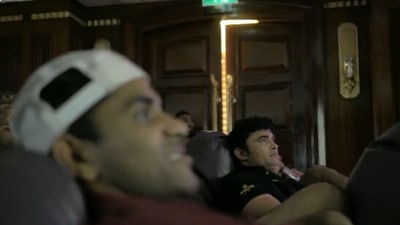 The image shows Pravin Tambe watching his biopic with Kolkata Knight Riders squad. (Twitter/@KKRiders)