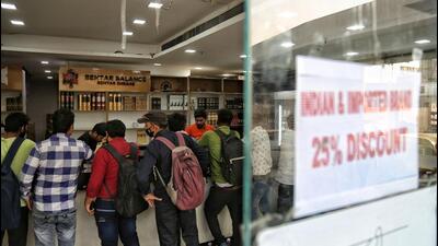 A wine shop notifies discount on alcohol prices, at New Delhi Railway Station, on Saturday. (Sanchit Khanna/HT) A wine shop notifies discount on alcohol prices, at New Delhi Railway Station, on Saturday. (Sanchit Khanna/HT)