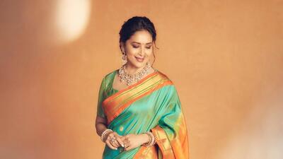 Madhuri Dixit-Nene looks ethereal in a teal and orange Paithani saree (PHOTO: INSTAGRAM) Madhuri Dixit-Nene looks ethereal in a teal and orange Paithani saree (PHOTO: INSTAGRAM)