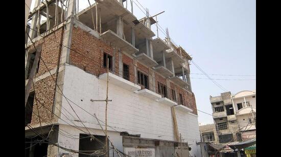 The vigilance department is conducting an inquiry to verify the findings of the report while the building branch officials in Ludhiana have been refuting the claims of illegal constructions, citing a number of discrepancies. (HT File/Representational image)