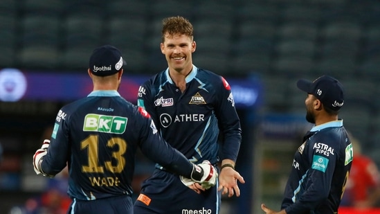 Lockie Ferguson of Gujarat Titans celebrates with teammates after the wicket of Prithvi Shaw of Delhi Capitals, during match 10 of the Indian Premier League 2022 cricket tournament between the Gujarat Titans and the Delhi Capitals, at the MCA International Stadium in Pune, Saturday, April 2, 2022.&nbsp;(PTI)