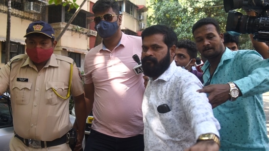 Independent witness K.P. Gosavi's bodyguard Prabhakar Sail and his advocate Tushar Kandhare are seen in this file photo. &nbsp;(Photo by Vijay Bate/HT Photo)(HT PHOTO)