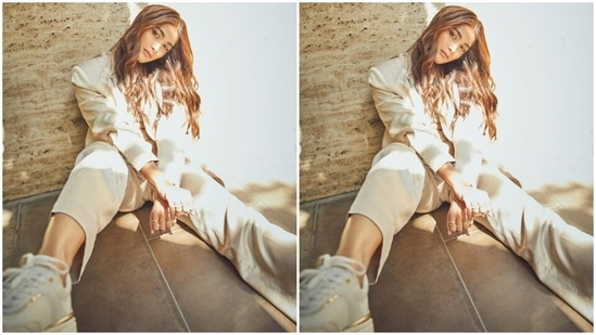 Pooja paired a beige blazer with a pair of formal trousers of the same colour and a white tube top. In white sneakers, she aced the look to perfection.(Instagram/@hegdepooja)