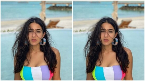 Sara further accessorised her look for the beach day out with blue statement hoop earrings printed in shades of red and yellow.(Instagram/@saraalikhan95)