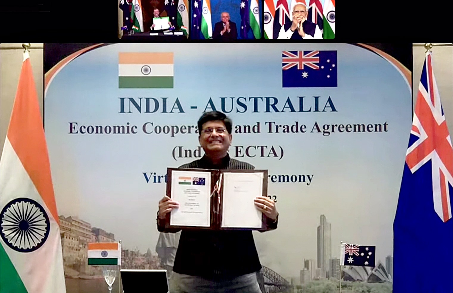 Union Minister of Commerce and Industry Piyush Goyal shows the virtually signed agreement of the India-Australia Economic Cooperation and Trade Agreement (IndAus ECTA). (ANI Photo) Union Minister of Commerce and Industry Piyush Goyal shows the virtually signed agreement of the India-Australia Economic Cooperation and Trade Agreement (IndAus ECTA). (ANI Photo)