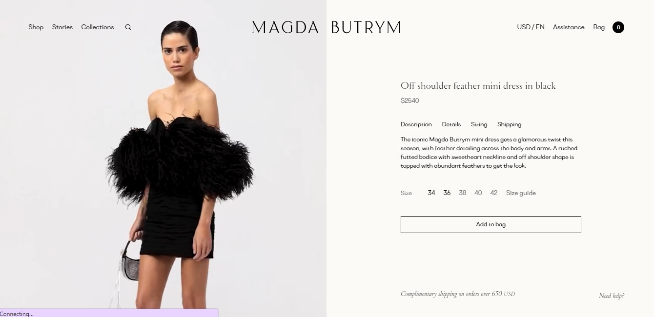 The price of Jacqueline's black mini-length ensemble. (magdabutrym.com)