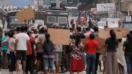 People attend a protest against Sri Lankan President Gotabaya Rajapaksa in a residential area in capital Colombo.