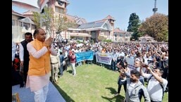 Himachal CM Jai Ram Thakur greets government staffers during the Karamchari Maha Sammelan in Shimla. (Deepak Sansta/HT)