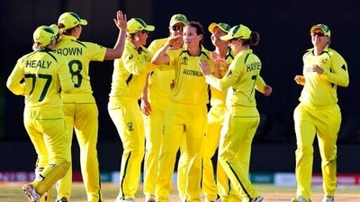 Australia's Megan Schutt, center, is congratulated by teammates after taking the wicket of England's Tamsin Beaumont during the final of the ICC Women's Cricket World Cup in Christchurch, New Zealand. (AP) Australia's Megan Schutt, center, is congratulated by teammates after taking the wicket of England's Tamsin Beaumont during the final of the ICC Women's Cricket World Cup in Christchurch, New Zealand. (AP)