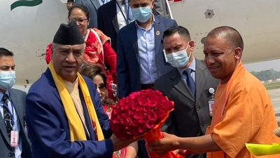 The chief minister greeted him with a bouquet upon his arrival at Lal Bahadur Shashtri International airport in Varanasi. (@PM_nepal_) The chief minister greeted him with a bouquet upon his arrival at Lal Bahadur Shashtri International airport in Varanasi. (@PM_nepal_)