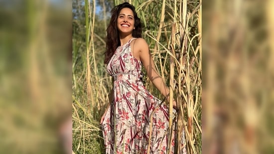 Wearing an easy-breezy floral maxi dress, Nushrratt Bharuccha "aimlessly walked around" and observed nature.(Instagram/@nushrrattbharuccha)