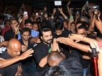 Ram Charan was mobbed by fans outside Mumbai's Gaiety theatre as he made a surprise appearance at a screening of his film RRR. Ram Charan was mobbed by fans outside Mumbai's Gaiety theatre as he made a surprise appearance at a screening of his film RRR.