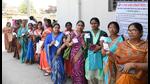 Ward councilors stand in a queue to cast their votes during the Bihar MLC elections, at Danapur, in Patna on Monday. (Santosh Kumar/HT Photo)