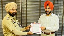 On Monday, the birthdays of 23 police personnel were made all the more special after Ludhiana commissioner of police Gurpreet Singh Bhullar wished the cops on their special day, and handed them certificates-cum-greeting cards signed by chief minister Bhagwant Mann and DGP VK Bhawra. (HT Photo)