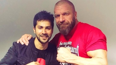 Varun Dhawan with Triple H. Varun Dhawan with Triple H.