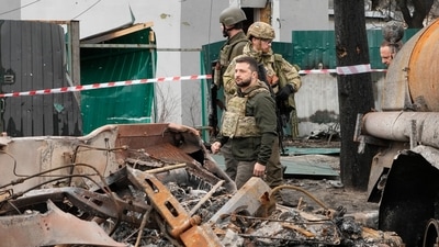 Ukrainian President Volodymyr Zelenskyy examines the site of a recent battle in Bucha, close to Kyiv, Ukraine. (AP) Ukrainian President Volodymyr Zelenskyy examines the site of a recent battle in Bucha, close to Kyiv, Ukraine. (AP)