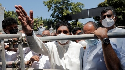 Sajith Premadasa, leader of the opposition alliance, Samagi Jana Balawegaya, shout slogans against President Gotabaya Rajapaksa. (Reuters)