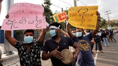 People took to streets, shouting slogans and held posters against President Gotabaya Rajapaksa in a residential area in Colombo, Sri Lanka. Amid the ongoing emergency, Rajapaksa had given the Sri Lankan military sweeping powers, including the right to arrest suspects without warrants. (REUTERS)