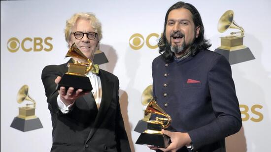 Ricky Kej with Stewart Copeland after winning Grammy for best new age album for Divine Tides at the 64th Annual Grammy Awards (AP)