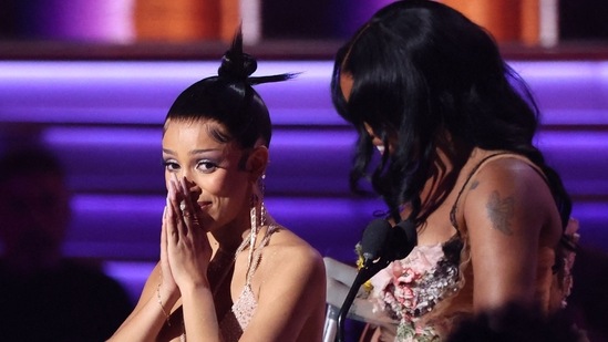 Doja Cat reacts after winning the Grammy Award for Best Pop Duo/Group Performance during the 64th Annual Grammy Awards show in Las Vegas. BTS was also nominated in the same category.(REUTERS)