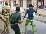 An unidentified person attacks constables at Gorakhnath Temple gate, on Sunday night.
