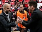 Pep Guardiola (L) and Diego Simeone