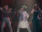 Abhishek Bachchan, Yami Gautam, and Nimrat Kaur in a still from Dasvi's new song Ghani Trip.