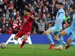 Mohamed Salah (L) scores a goal against Manchester City.(AP) Mohamed Salah (L) scores a goal against Manchester City.(AP)