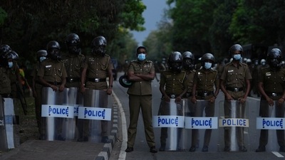 Sri Lankan police officers stand guard near the parliament during a protest in Colombo, Sri Lanka, Tuesday, April 5, 2022. (AP) Sri Lankan police officers stand guard near the parliament during a protest in Colombo, Sri Lanka, Tuesday, April 5, 2022. (AP)