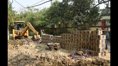 Liquor bottles being destroyed in Patna. (HT Photo) Liquor bottles being destroyed in Patna. (HT Photo)