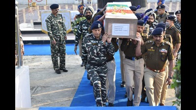 Senior paramilitary and police officers carry the coffin of slain CRPF man during a wreath laying ceremony in Srinagar on Tuesday. (Waseem Andrabi/Hindustan Times) Senior paramilitary and police officers carry the coffin of slain CRPF man during a wreath laying ceremony in Srinagar on Tuesday. (Waseem Andrabi/Hindustan Times)