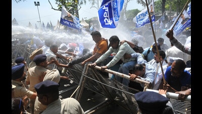 Police using water cannons during AAP’s protest against the water tariff hike in Chandigarh on Wednesday. (Ravi Kumar/HT)
