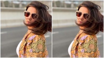 Hina accessorised her floral ensemble with minimal jewellery, including a statement-worthy necklace featuring glittering stones and an emerald pendant. (Instagram/@realhinakhan) Hina accessorised her floral ensemble with minimal jewellery, including a statement-worthy necklace featuring glittering stones and an emerald pendant. (Instagram/@realhinakhan)