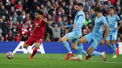 Mohamed Salah (L) scores a goal against Manchester City. (AP) Mohamed Salah (L) scores a goal against Manchester City. (AP)