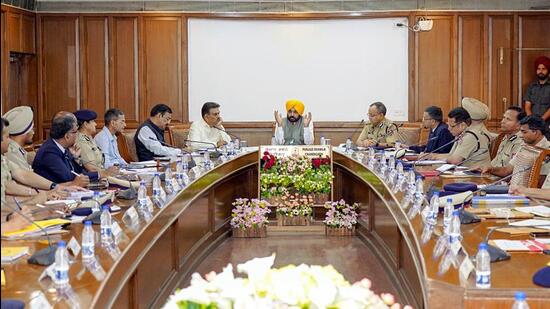 Punjab chief minister Bhagwant Mann chairs a high-level meeting of the police department in Chandigarh on Tuesday. (ANI)